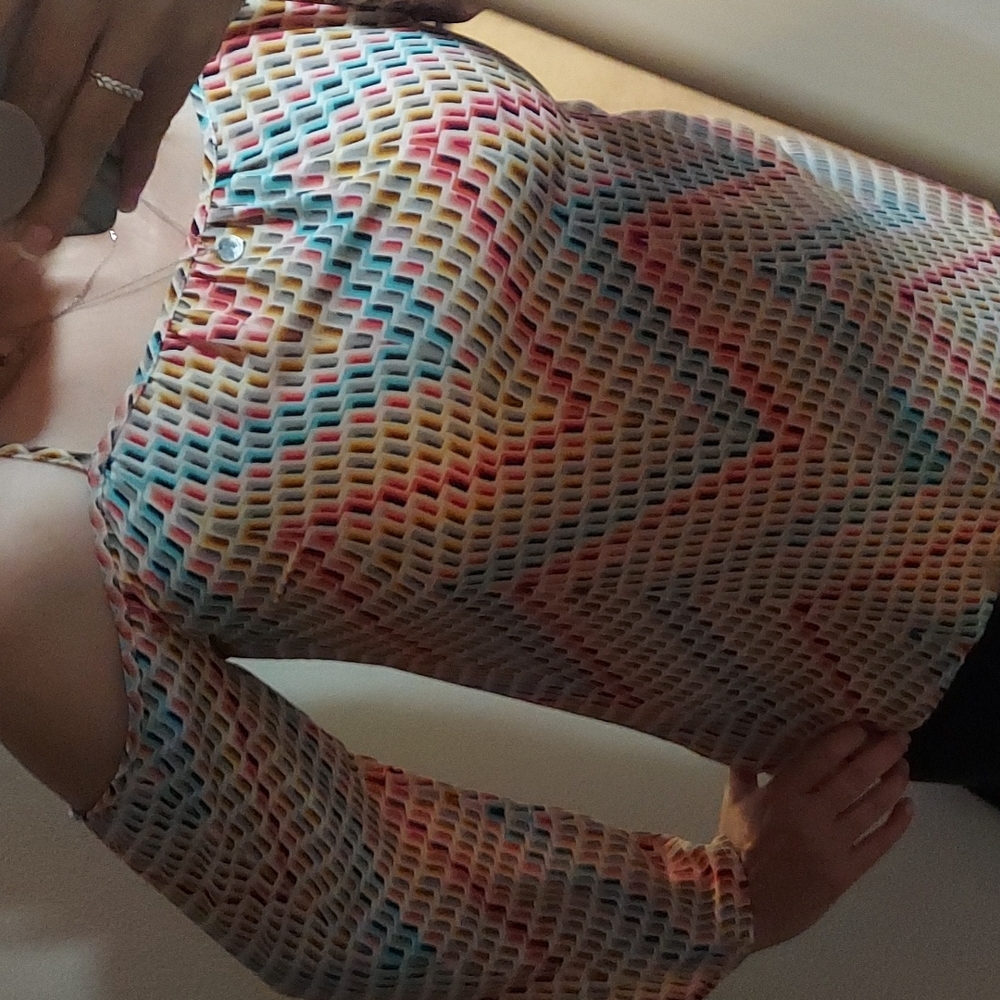 Funky boutique sexy cold shoulder/off shoulder top. Looks great with jeans.